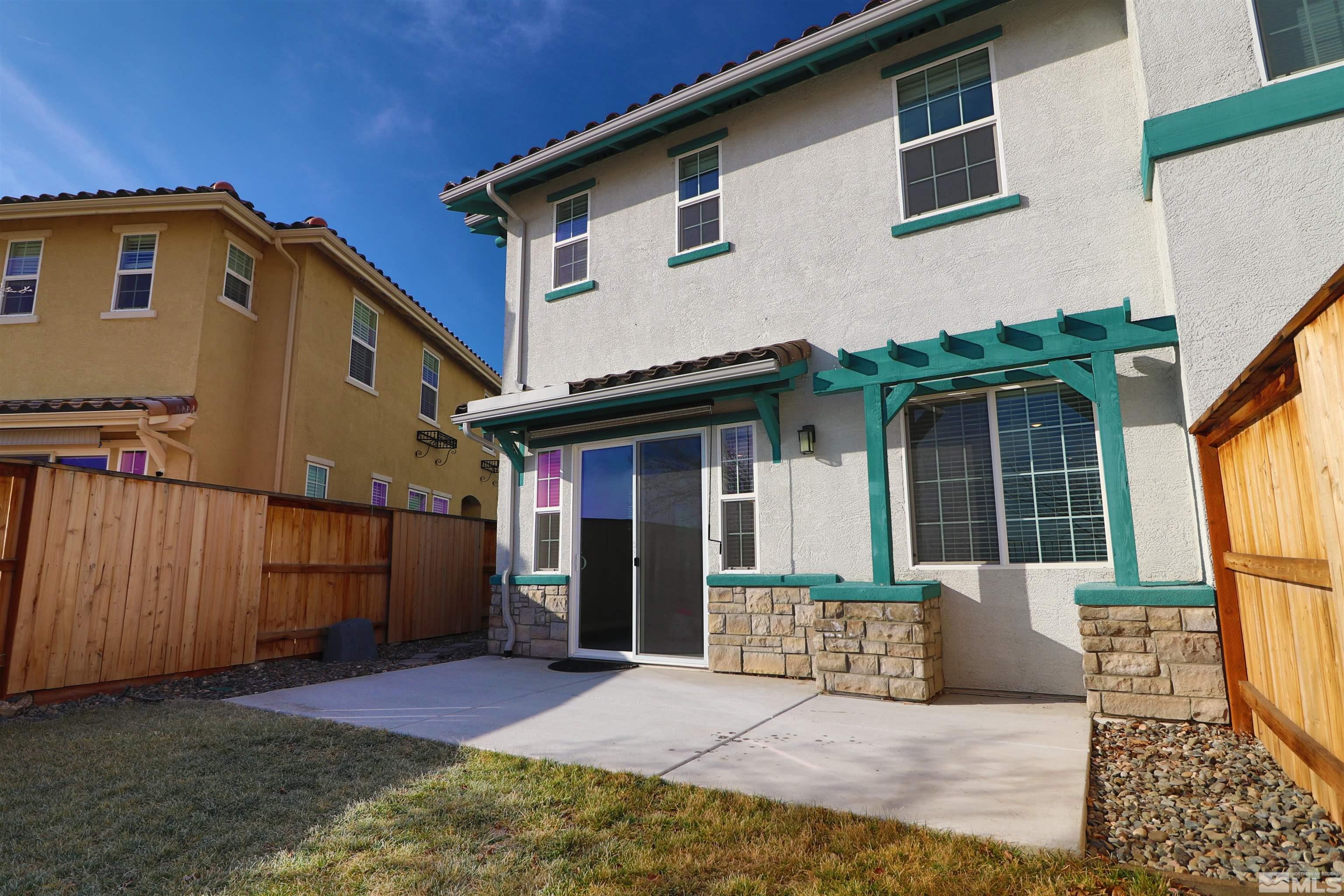 1920 Dark Horse Road, Unit C Reno, NV 89521 - Photo 20 of 26 a view of a house with wooden floor and a yard