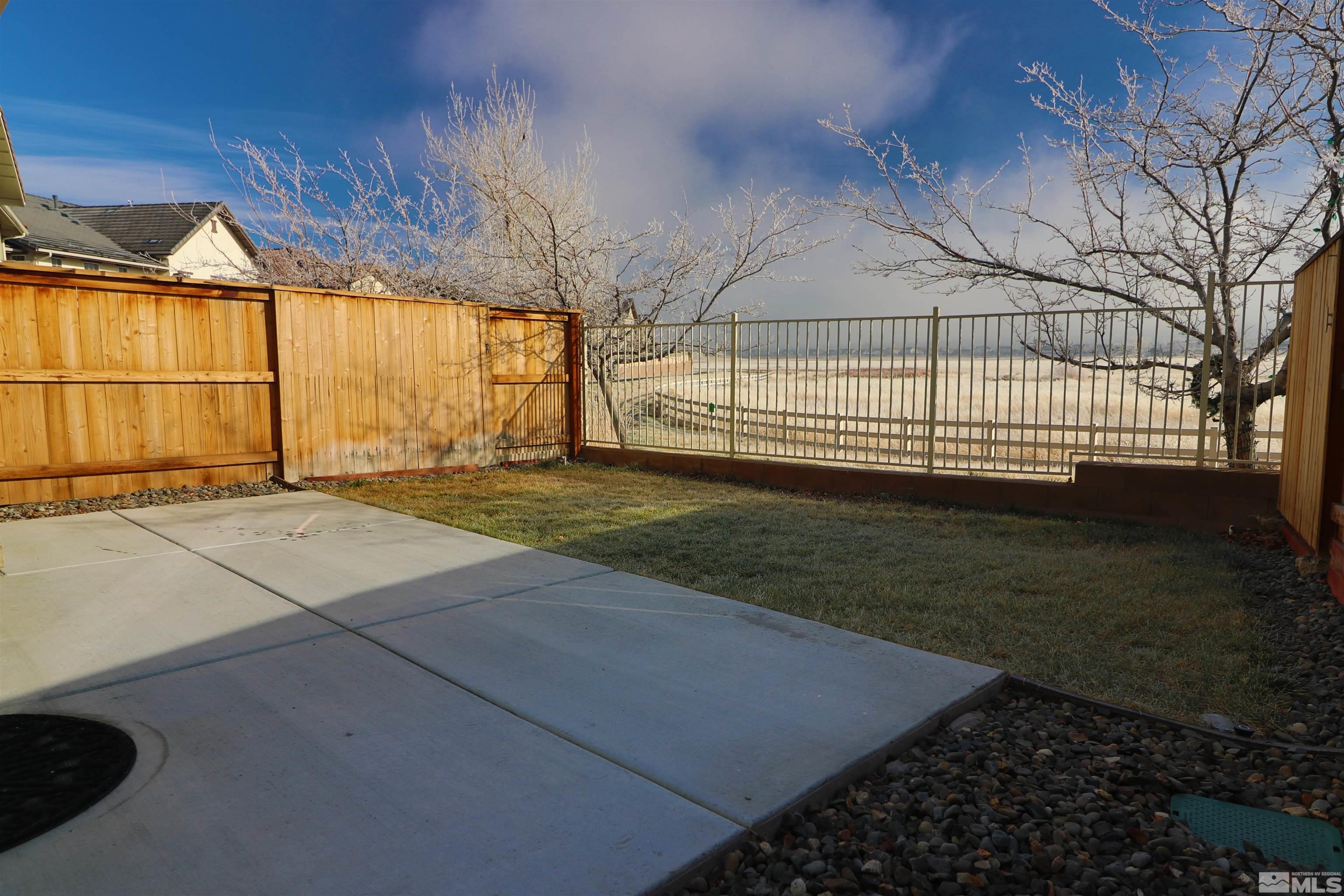 1920 Dark Horse Road, Unit C Reno, NV 89521 - Photo 21 of 26 a view of a backyard