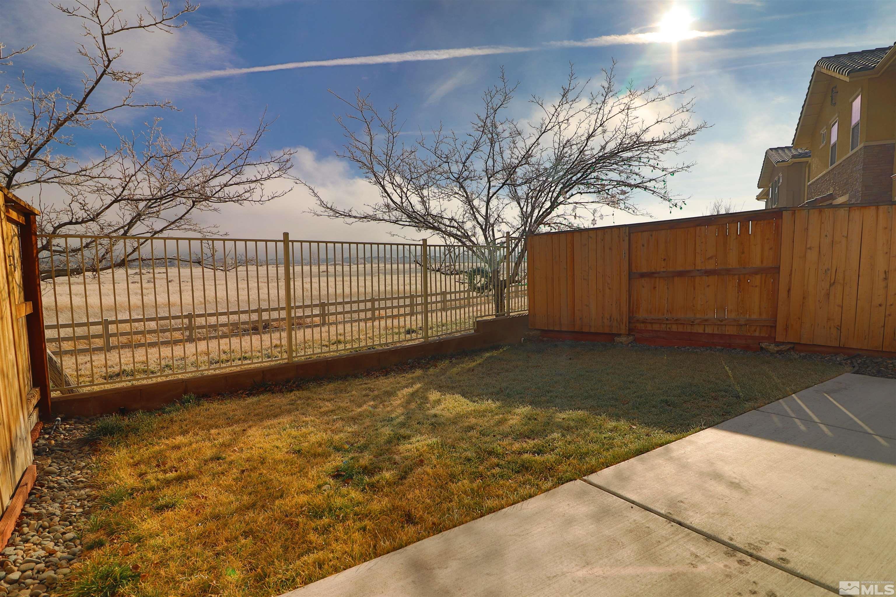 1920 Dark Horse Road, Unit C Reno, NV 89521 - Photo 22 of 26 a view of a backyard