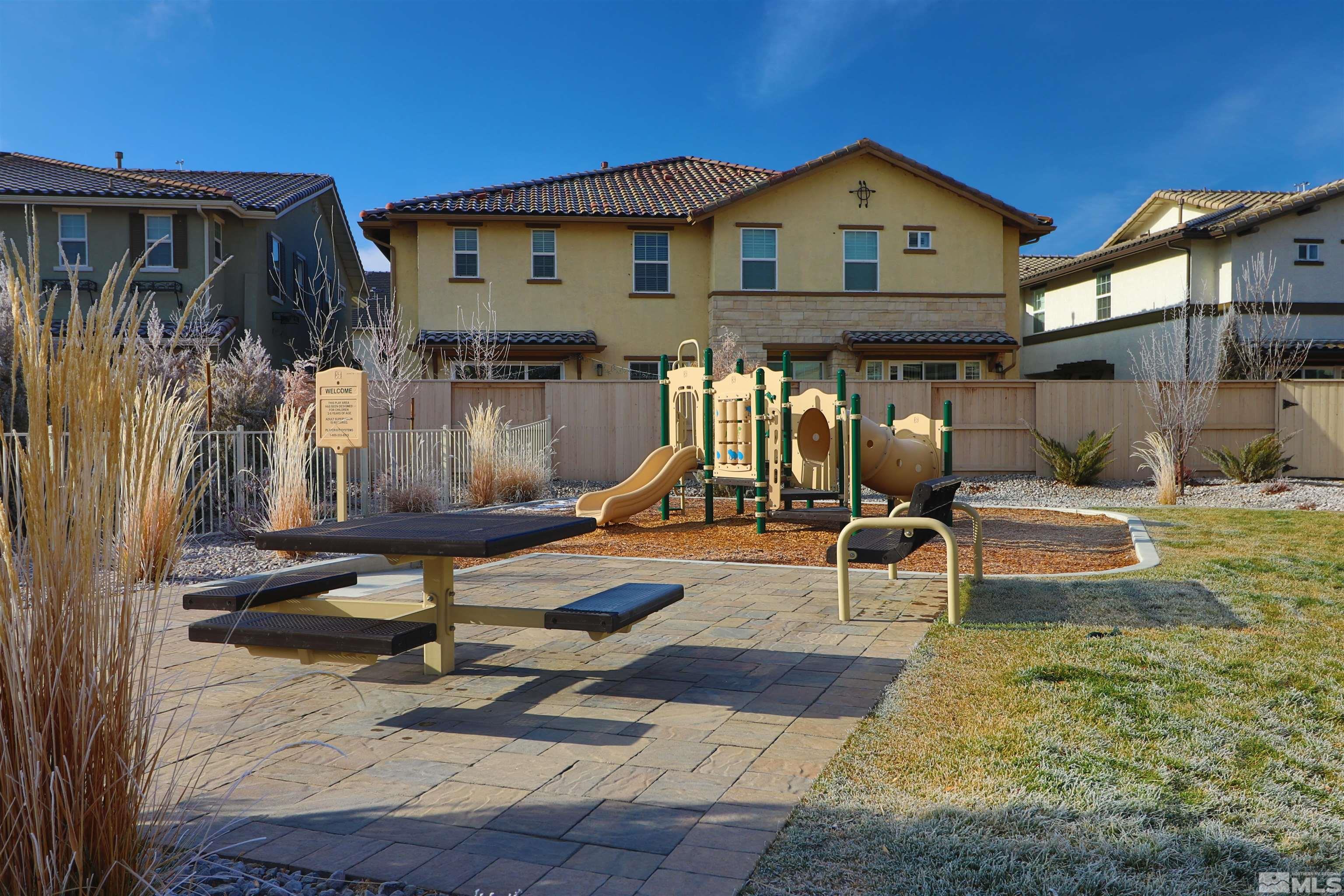 1920 Dark Horse Road, Unit C Reno, NV 89521 - Photo 25 of 26 a view of a house with backyard and porch