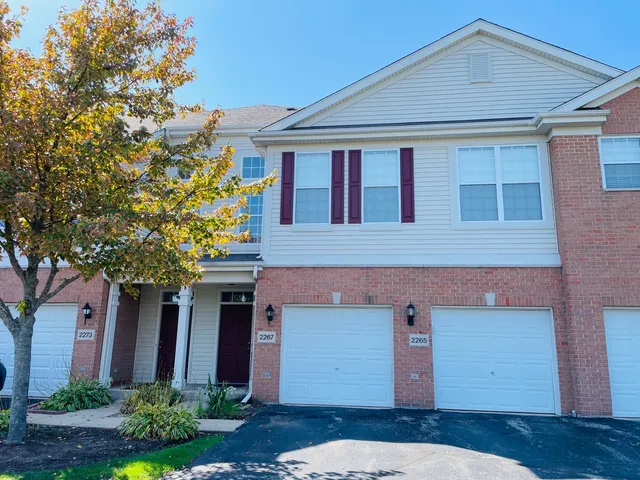 a front view of house with yard