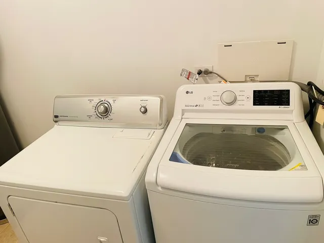 a view of a hallway with seating area