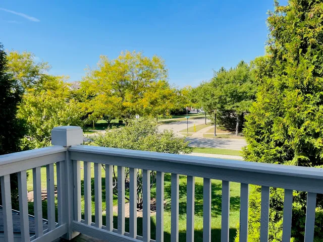 a view of a lake from a balcony