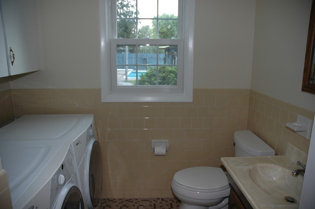 13 Ansie Road Chelmsford, MA 01824 - Photo 13 of 30 a bathroom with a sink toilet and window