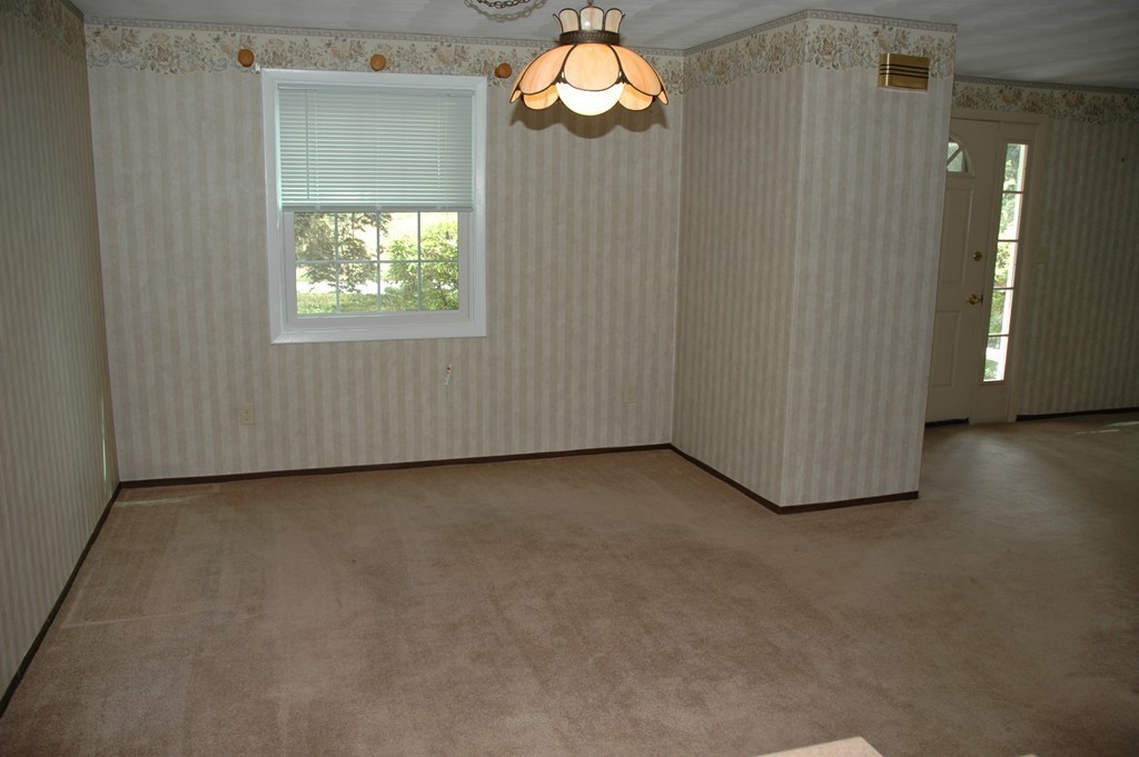13 Ansie Road Chelmsford, MA 01824 - Photo 10 of 30 an empty room with windows