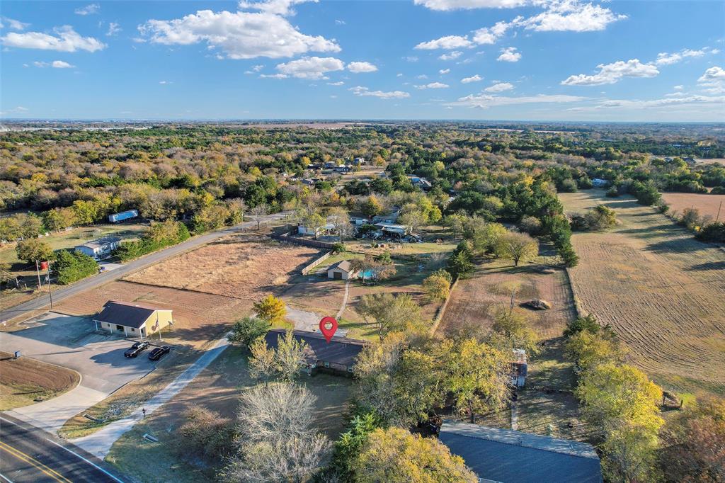 717 Houston Street Anna, TX 75409 - Photo 20 of 25 an aerial view of a houses with a yard