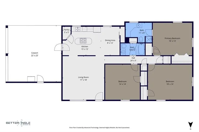 a front view of a house with a yard covered with snow