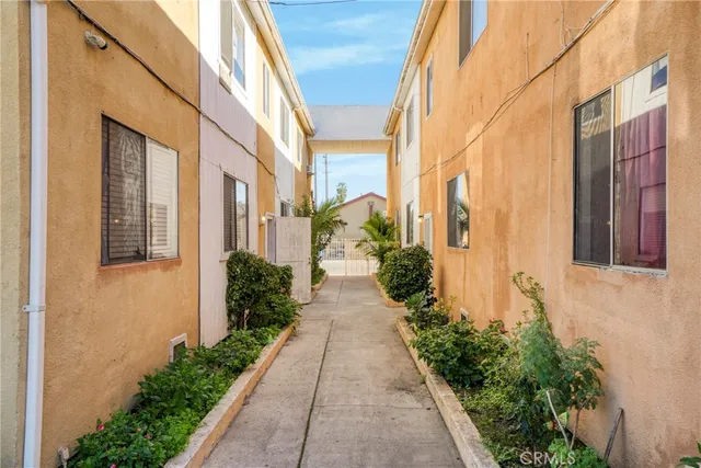 a view of a cars park in front of a house