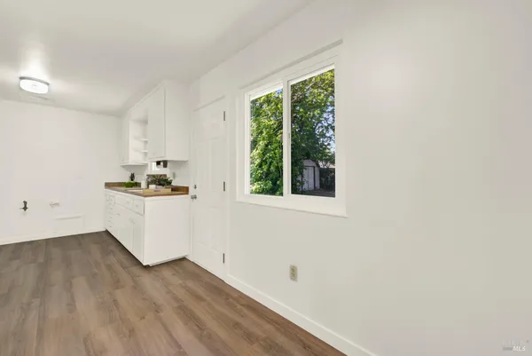 a bathroom with a sink a toilet and bathtub