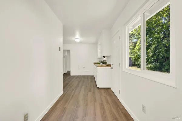 a bathroom with a sink a bathtub and a mirror