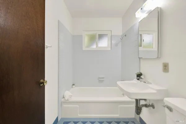 a house view with a backyard space