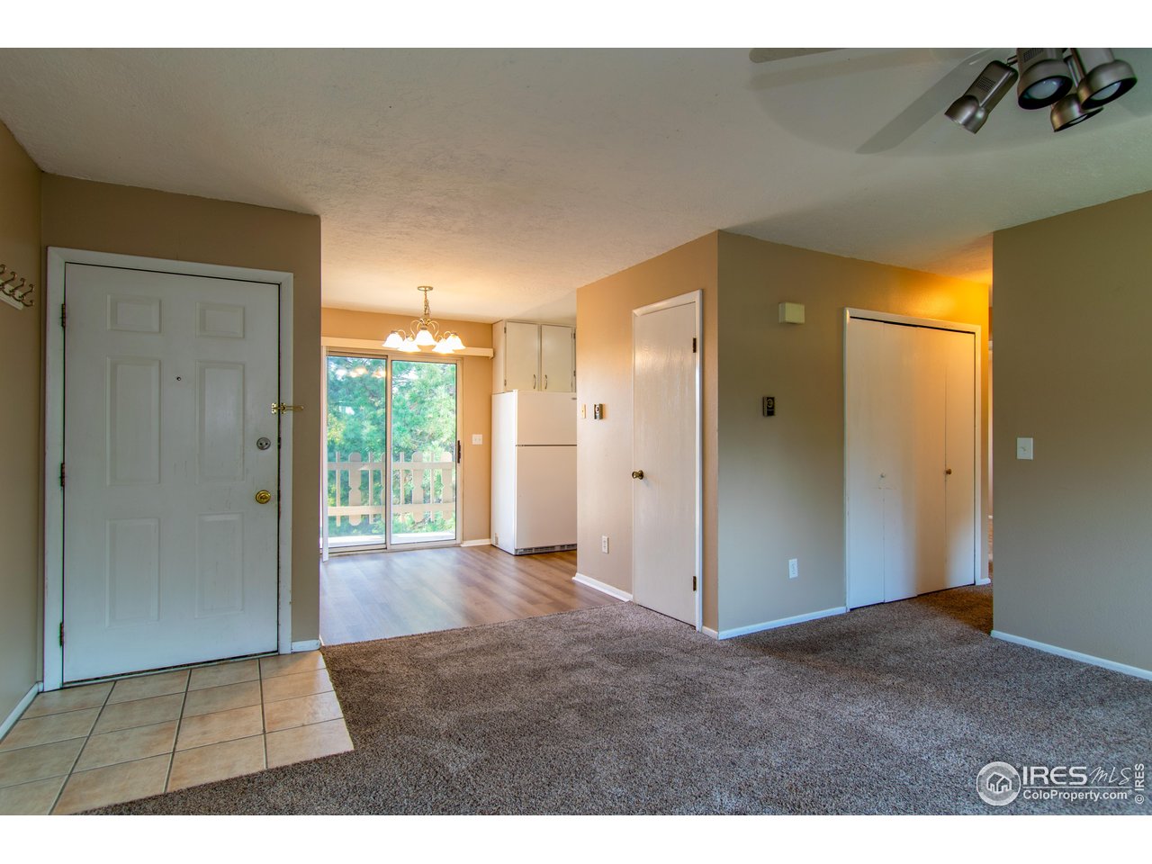 1024 East Swallow Road, Unit 233 Fort Collins, CO 80525 - Photo 1 of 18 Entry and dining room