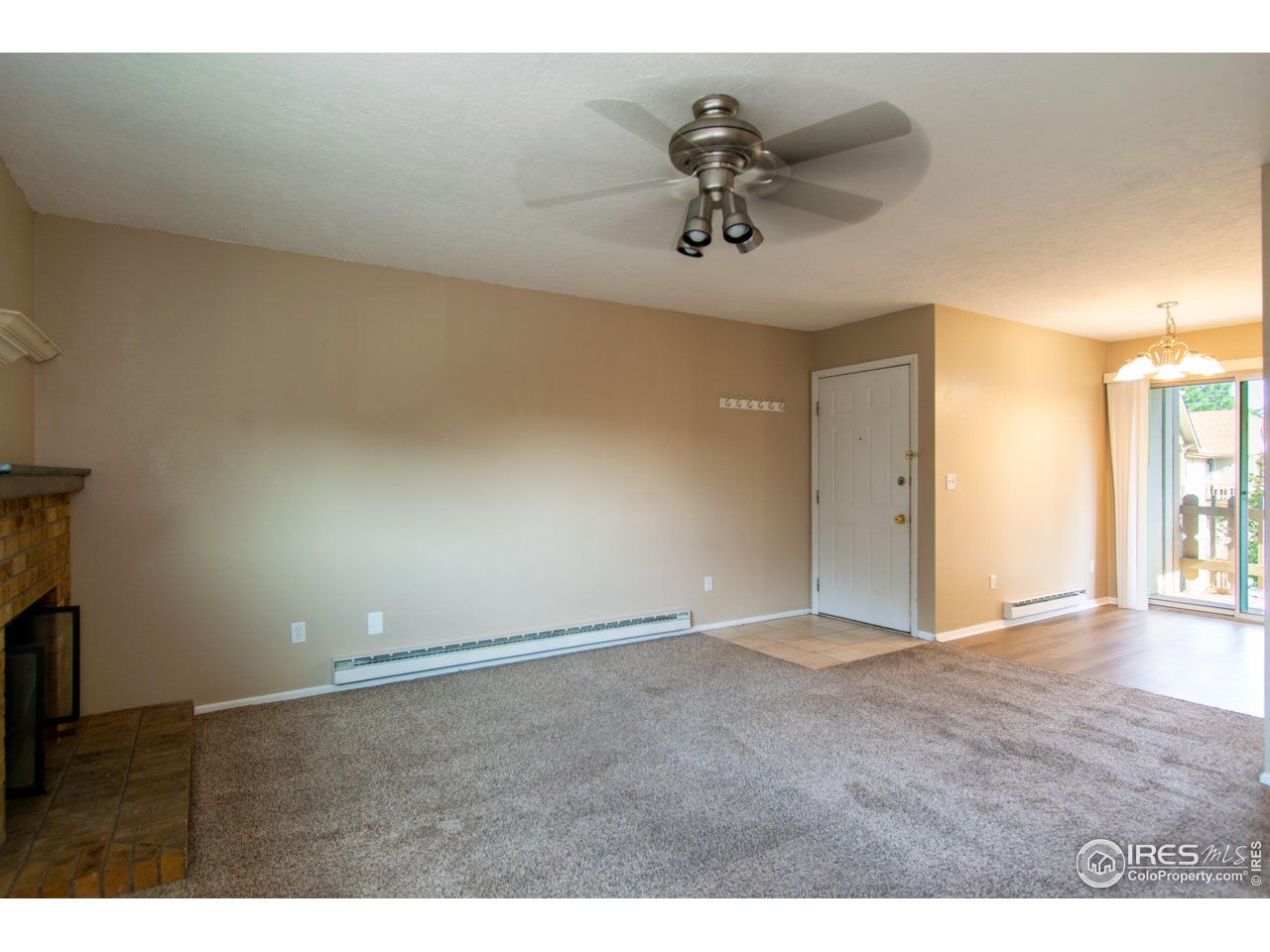 1024 East Swallow Road, Unit 233 Fort Collins, CO 80525 - Photo 7 of 18 Living Room and dining room