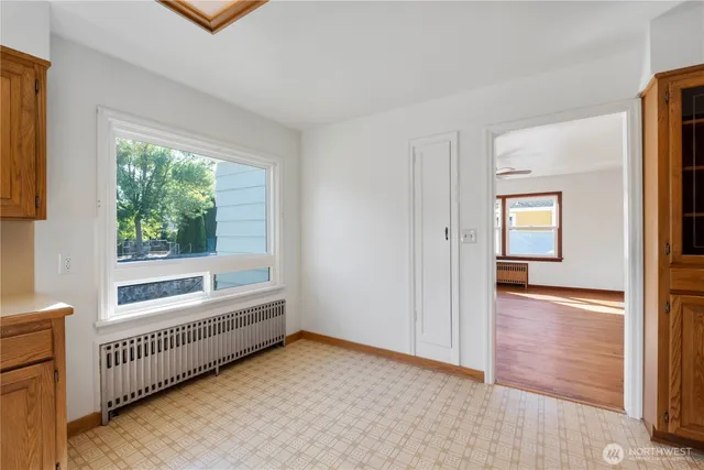 a view of an empty room and window