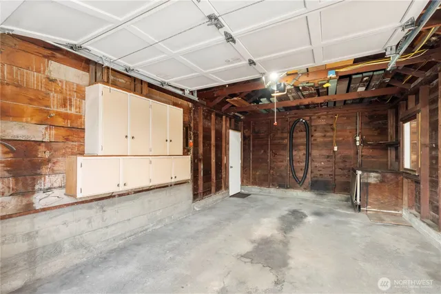a view of a room with wooden walls