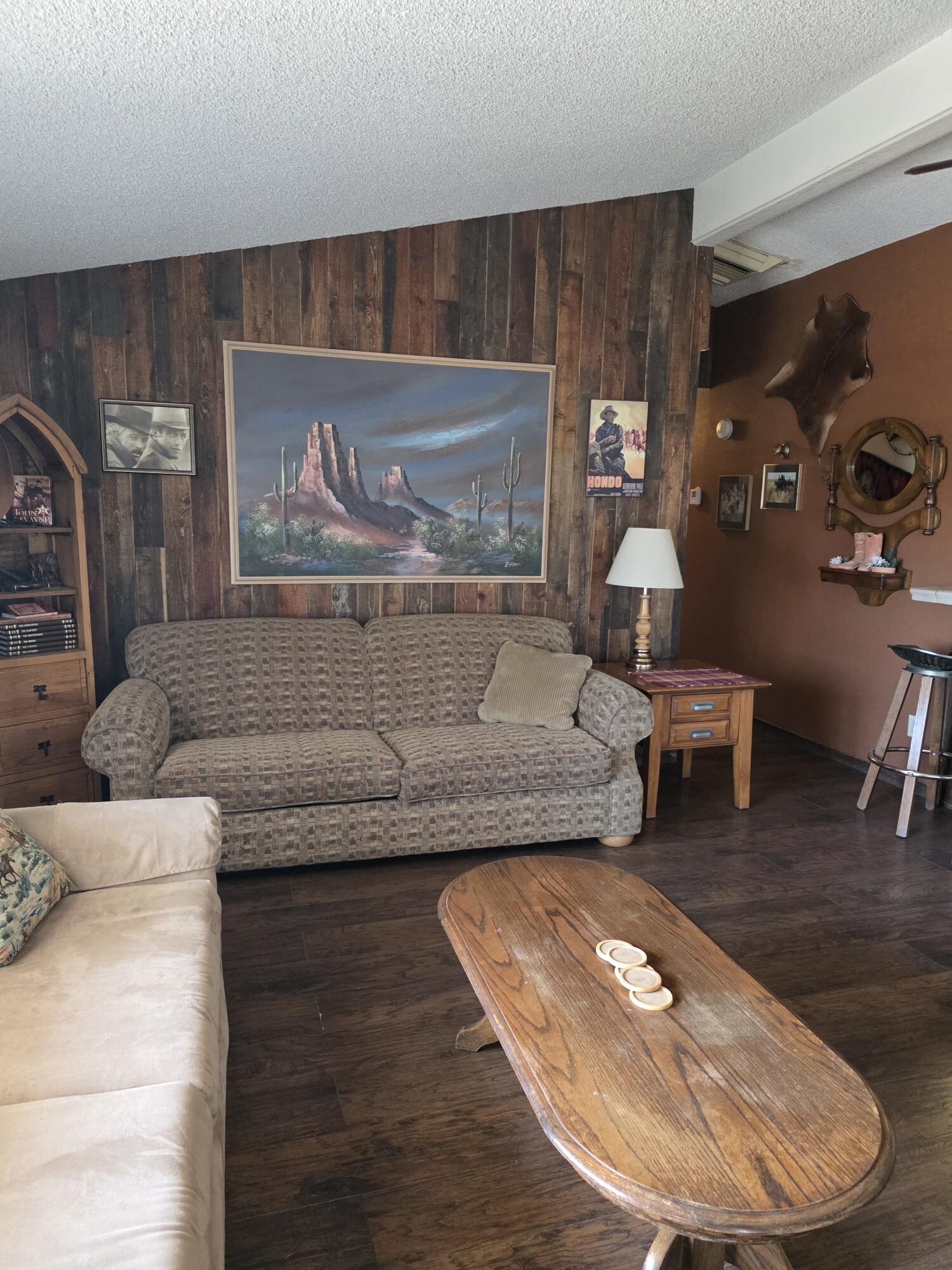 10595 Hot Mineral Spa Road, Unit 228 Niland, CA 92257 - Photo 11 of 38 a living room with furniture and wooden floor