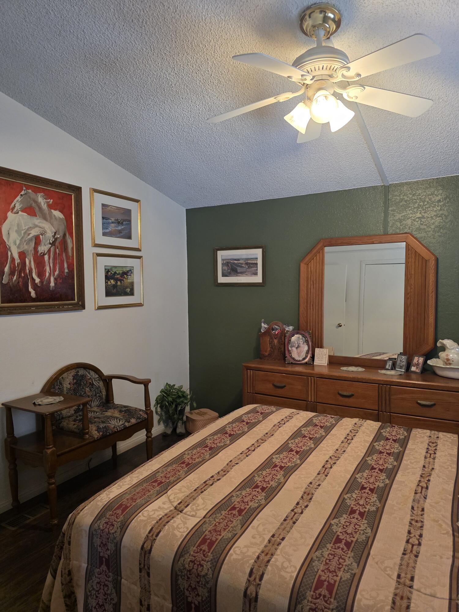 10595 Hot Mineral Spa Road, Unit 228 Niland, CA 92257 - Photo 13 of 38 a bedroom with a bed and a flat screen tv