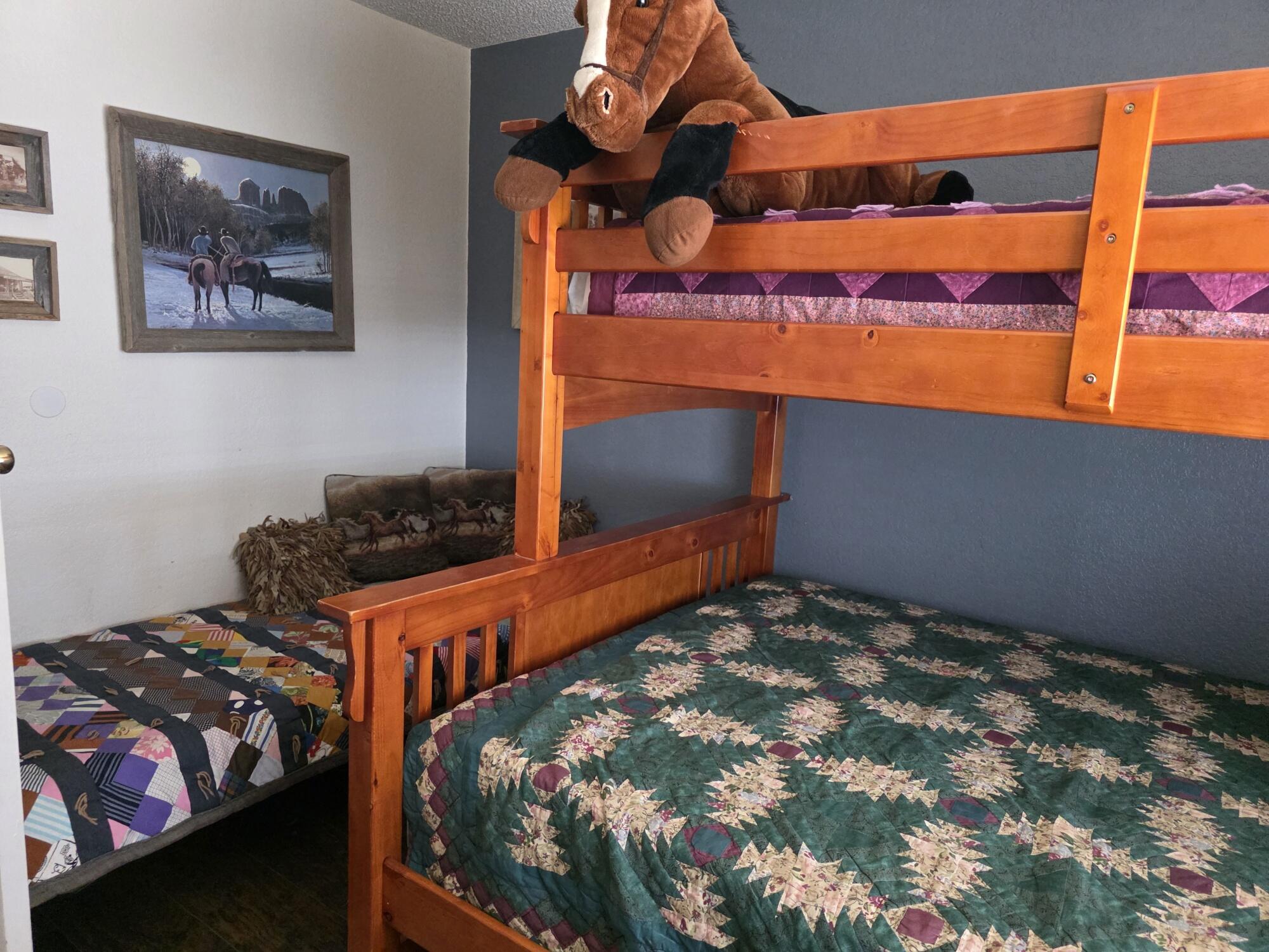 10595 Hot Mineral Spa Road, Unit 228 Niland, CA 92257 - Photo 14 of 38 a bedroom with a bed and a window