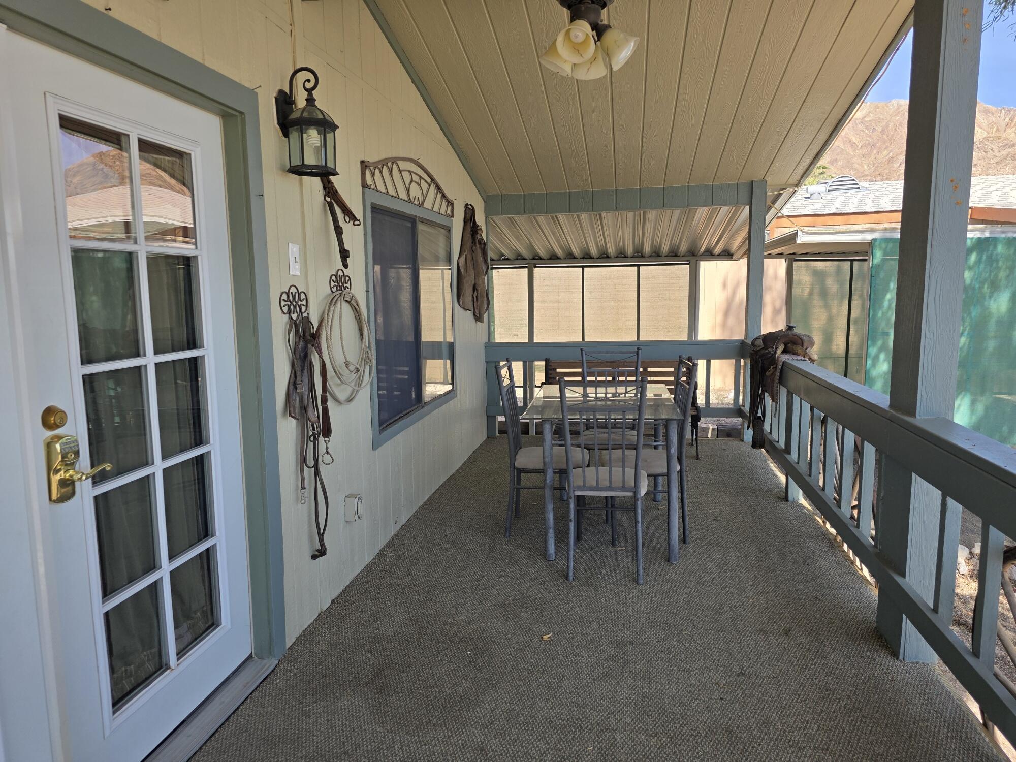 10595 Hot Mineral Spa Road, Unit 228 Niland, CA 92257 - Photo 19 of 38 a view of a dining room with furniture window and outside view