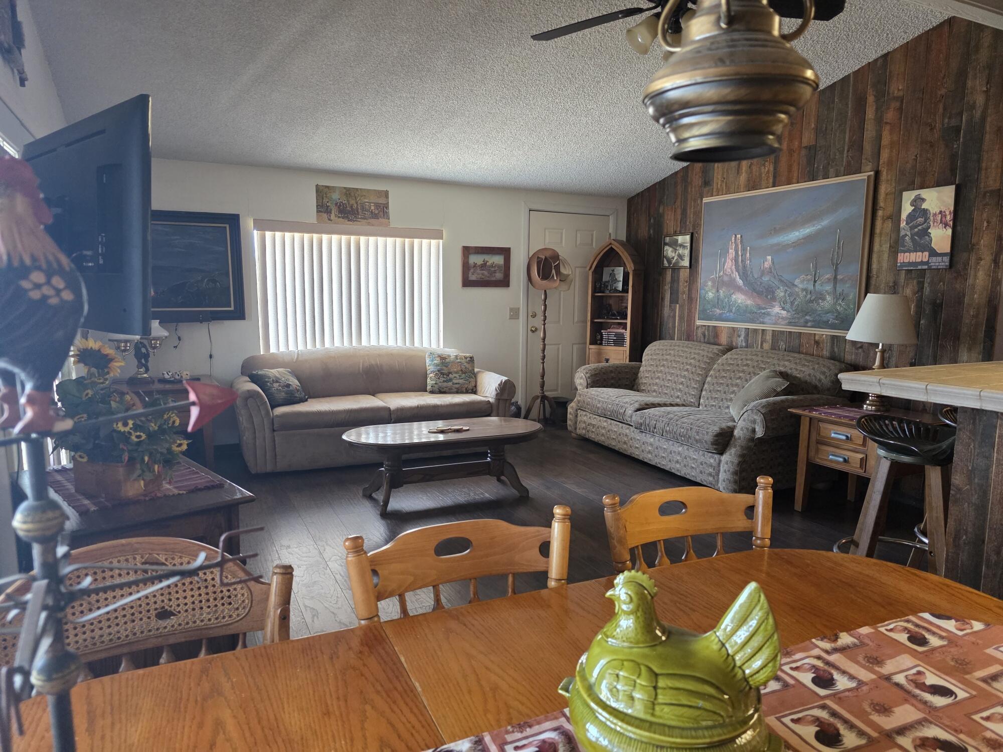 10595 Hot Mineral Spa Road, Unit 228 Niland, CA 92257 - Photo 8 of 38 a living room with furniture a rug and a window