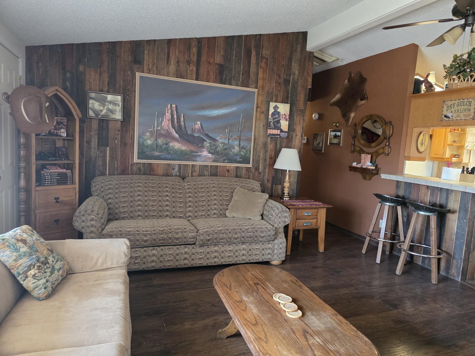 10595 Hot Mineral Spa Road, Unit 228 Niland, CA 92257 - Photo 10 of 38 a living room with furniture and wooden floor