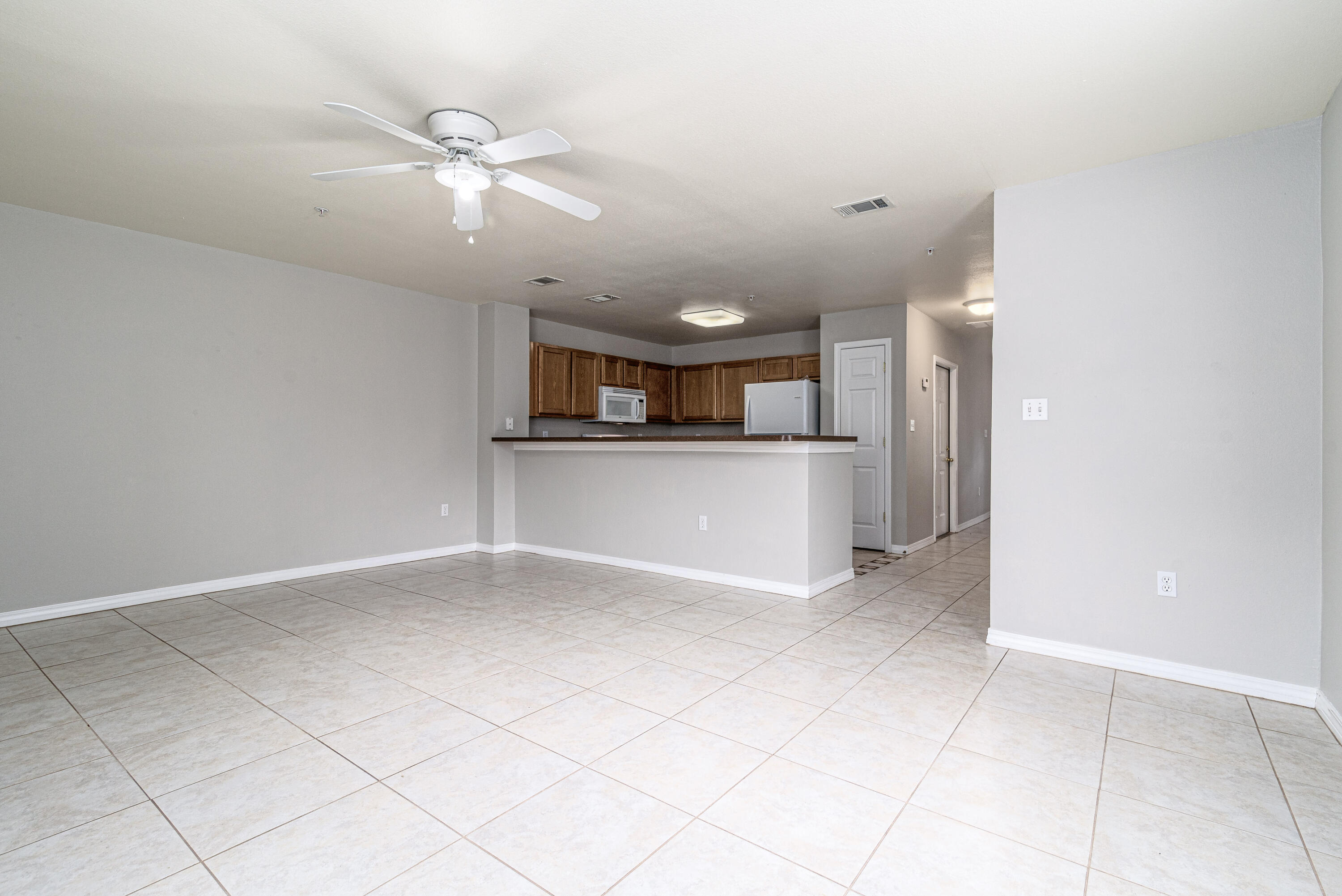 100 Corwin Drive, Unit 100 Crestview, FL 32539 - Photo 11 of 30 a view of a kitchen with a sink and a window