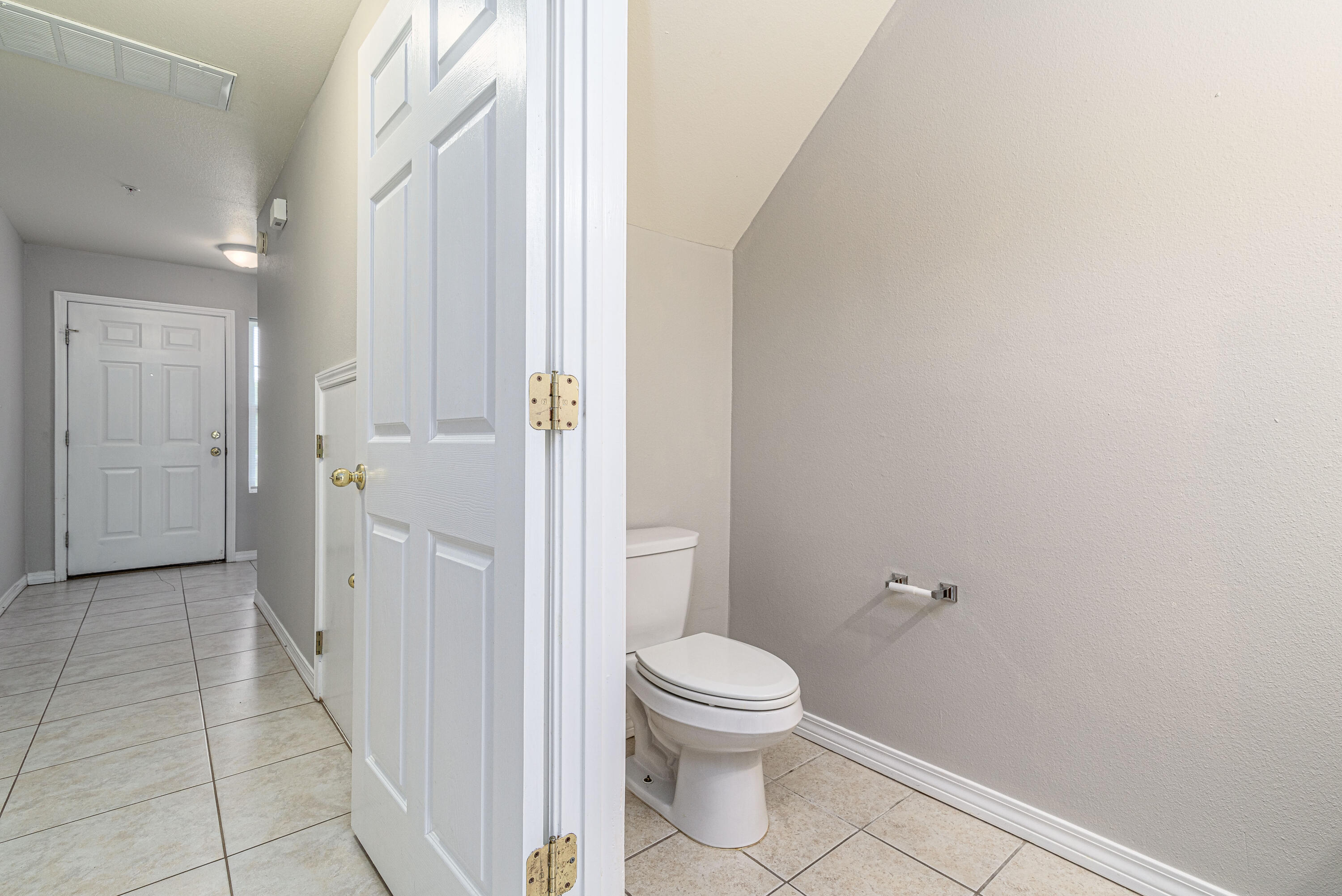 100 Corwin Drive, Unit 100 Crestview, FL 32539 - Photo 15 of 30 a bathroom with a toilet and a shower