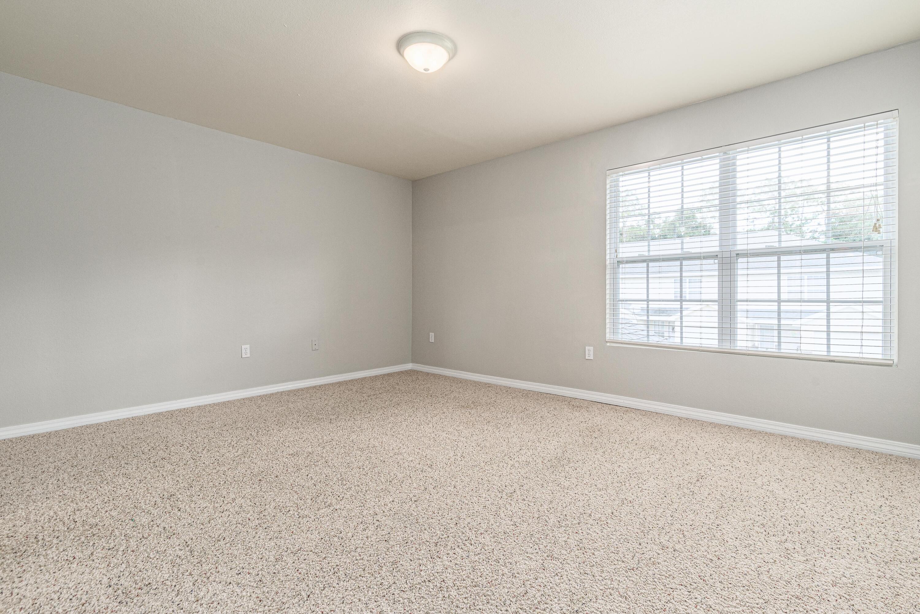 100 Corwin Drive, Unit 100 Crestview, FL 32539 - Photo 21 of 30 an empty room with a window