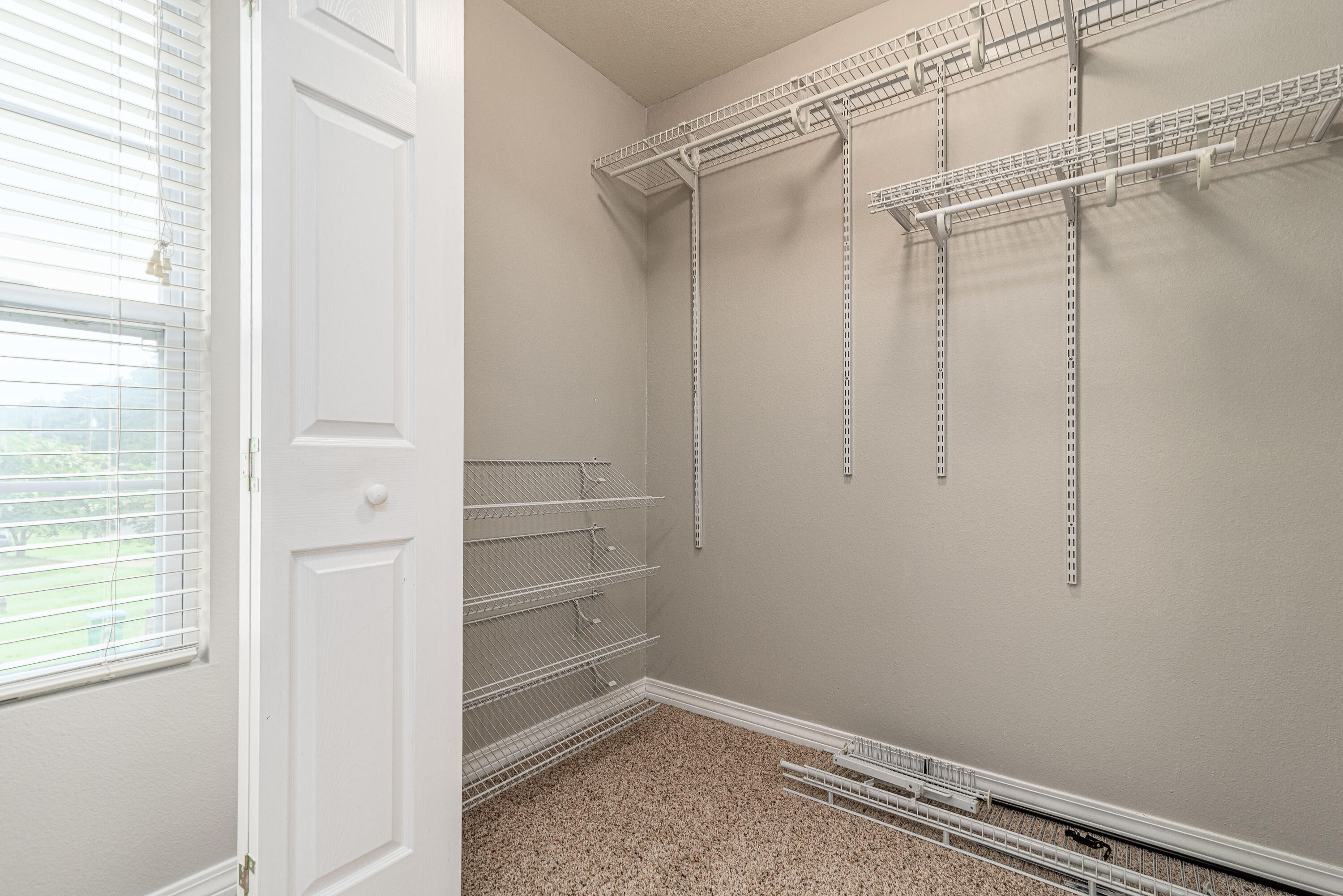 100 Corwin Drive, Unit 100 Crestview, FL 32539 - Photo 24 of 30 a view of an empty walk in closet
