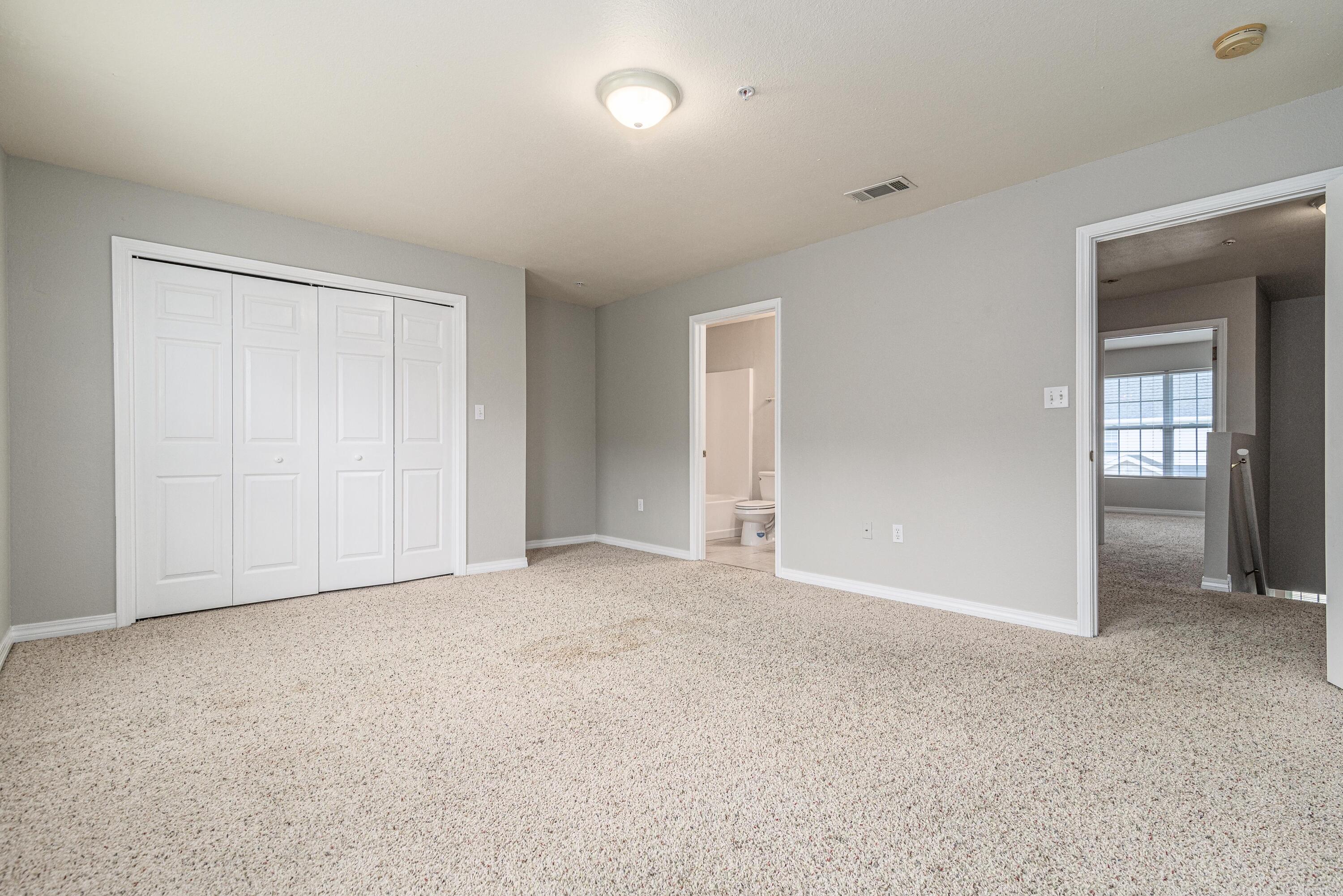 100 Corwin Drive, Unit 100 Crestview, FL 32539 - Photo 26 of 30 an empty room with closet area