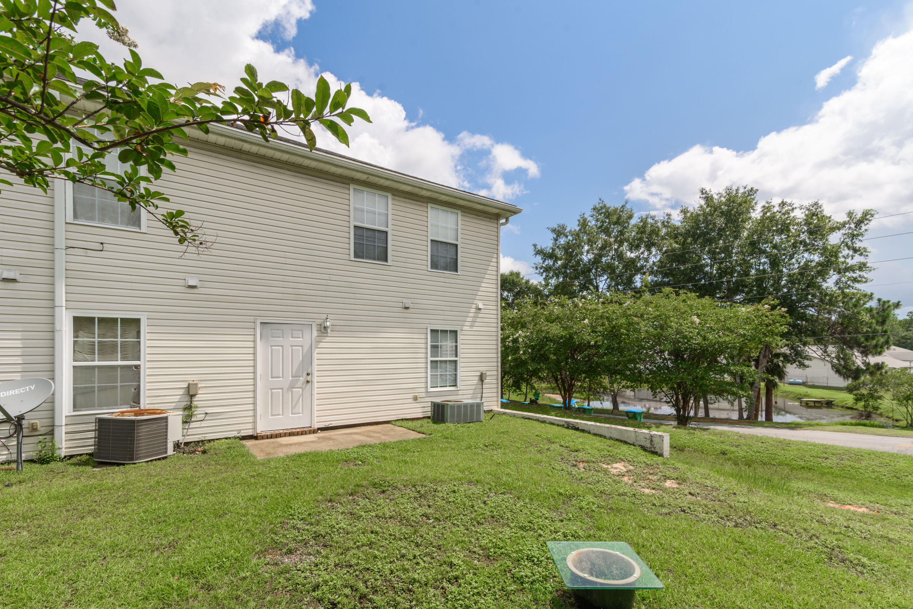 100 Corwin Drive, Unit 100 Crestview, FL 32539 - Photo 30 of 30 a view of a backyard with a garden