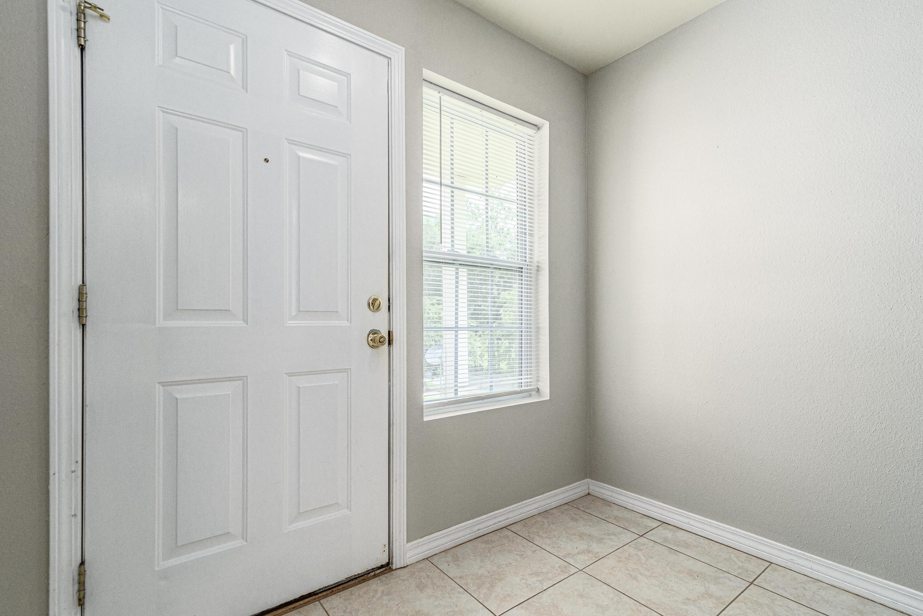 100 Corwin Drive, Unit 100 Crestview, FL 32539 - Photo 4 of 30 an empty room with windows