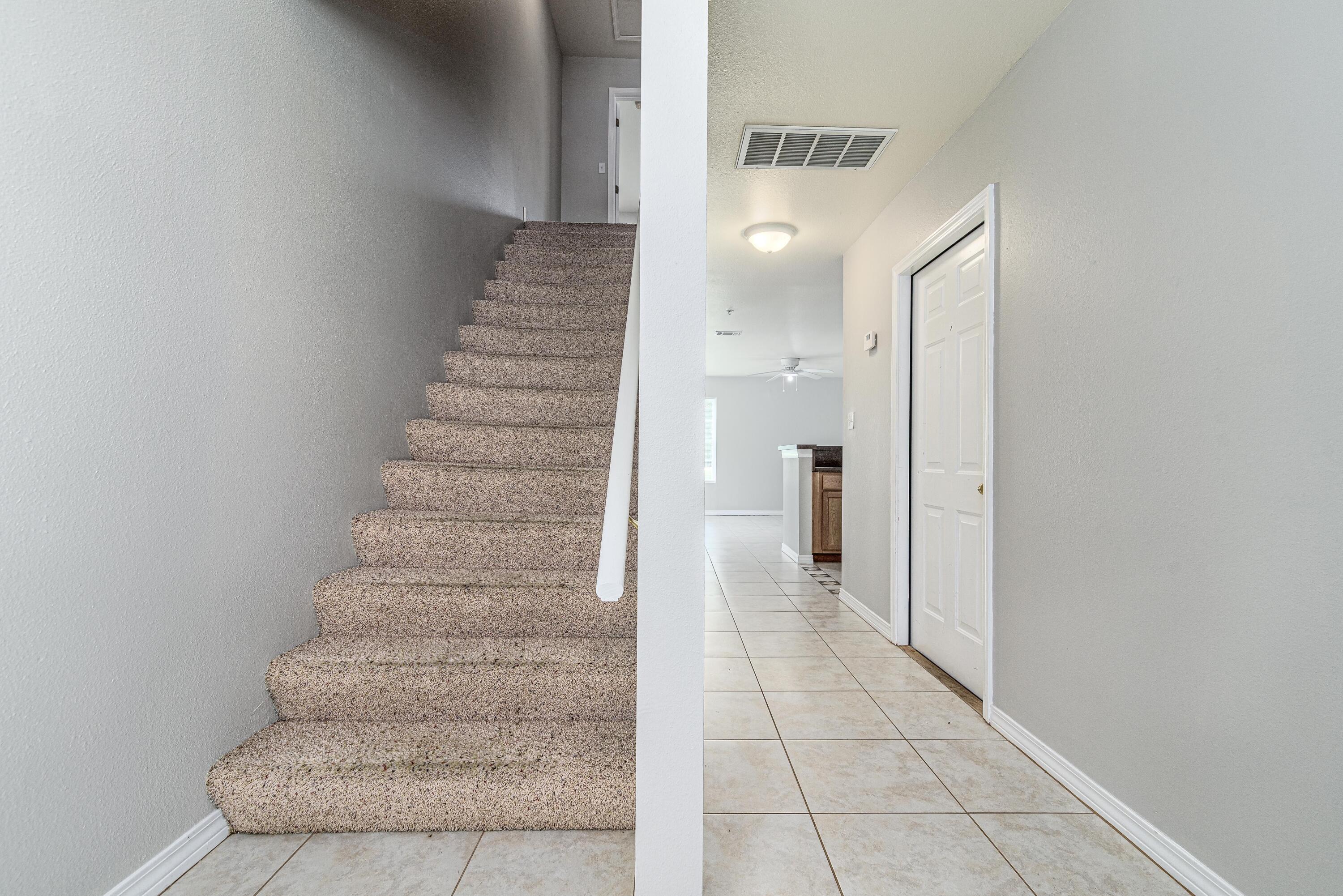 100 Corwin Drive, Unit 100 Crestview, FL 32539 - Photo 5 of 30 a view of a hallway with stairs