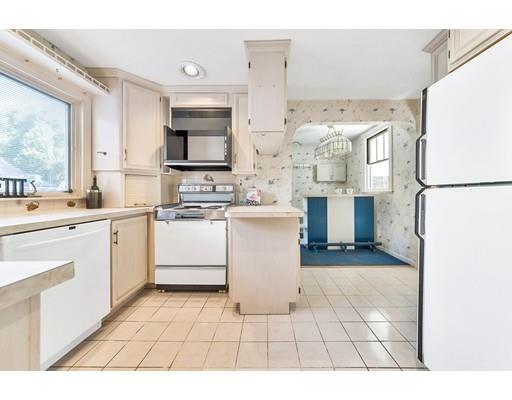 35 Perkins Street Springfield, MA 01118 - Photo 11 of 23 a kitchen with a sink appliances and cabinets