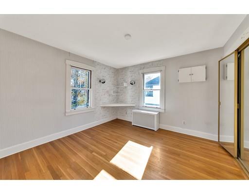 35 Perkins Street Springfield, MA 01118 - Photo 18 of 23 an empty room with windows and closet