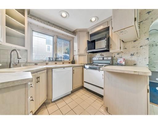 35 Perkins Street Springfield, MA 01118 - Photo 9 of 23 a kitchen with a sink cabinets and window