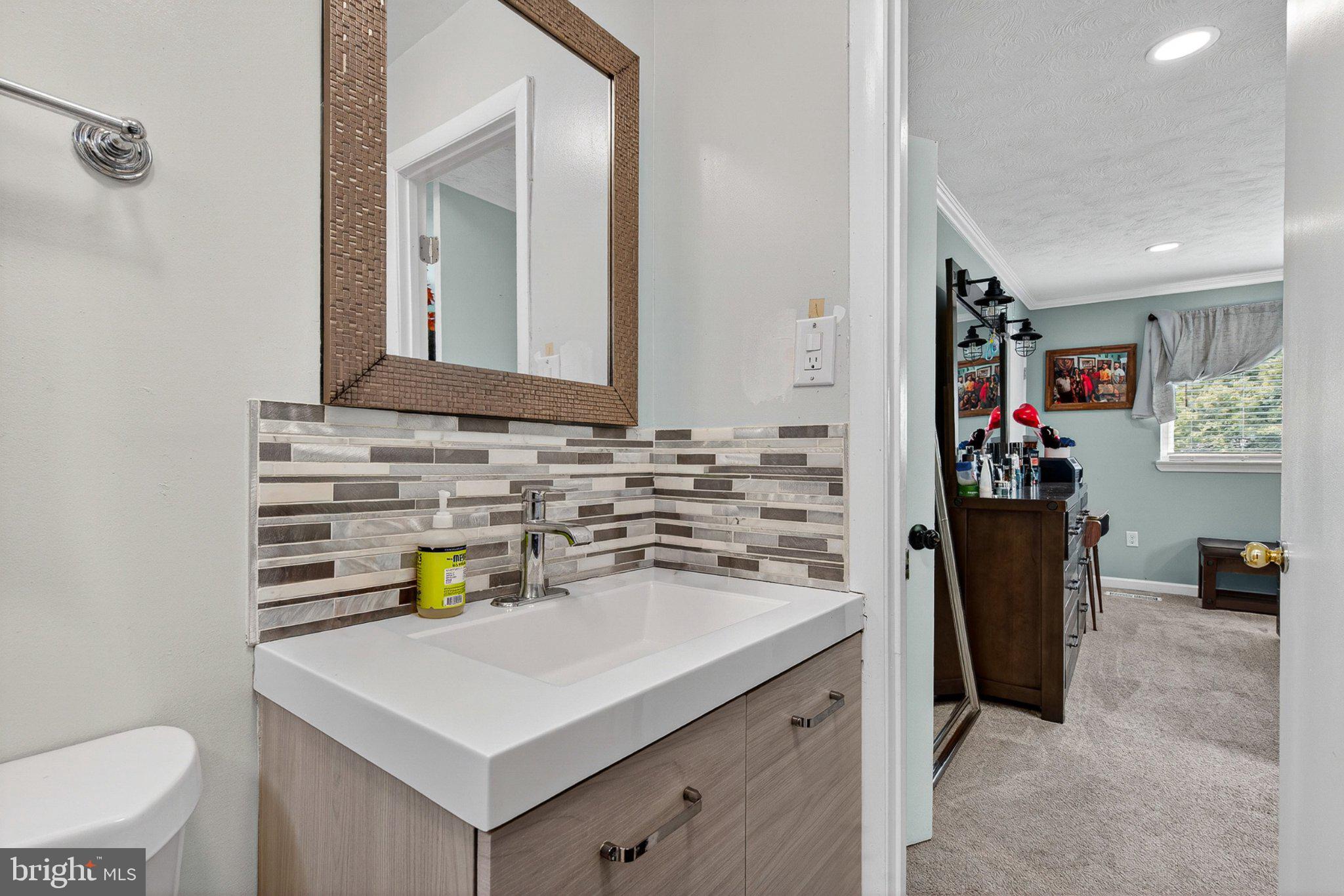 3947 Susanna Road Randallstown, MD 21133 - Photo 23 of 52 Modern bathroom with stylish accents.