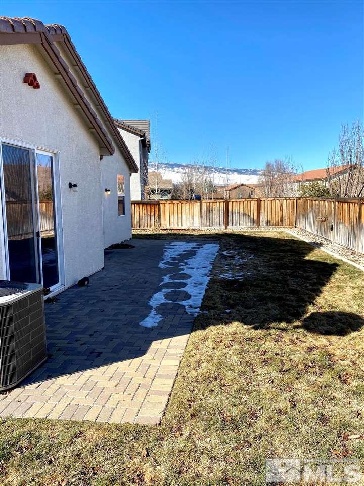 445 Pesaro Way Reno, NV 89521 - Photo 23 of 24 a view of a backyard of the house