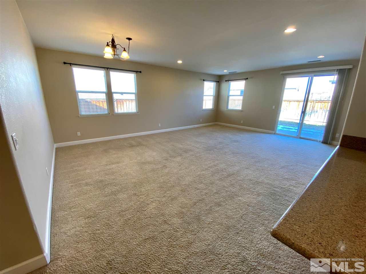 445 Pesaro Way Reno, NV 89521 - Photo 5 of 24 a view of an empty room and window