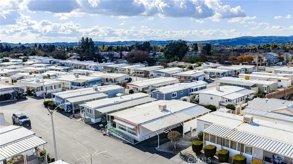an aerial view of residential houses and outdoor space