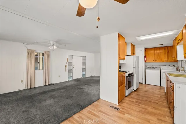 a view of a kitchen with furniture and a kitchen