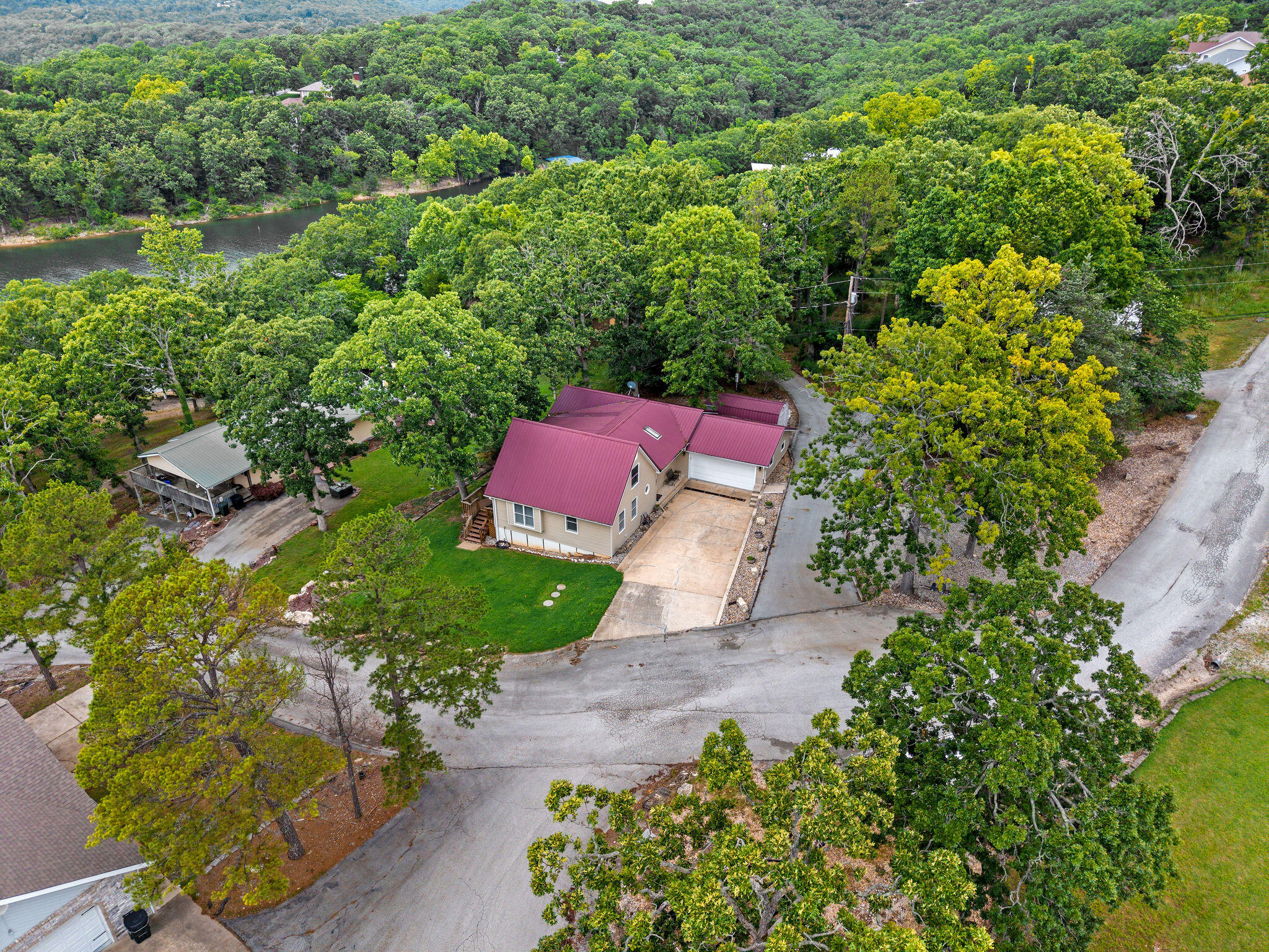 221 Stump Hollow Lane Reeds Spring, MO 65737 - Photo 3 of 39 DJI_20260607115956_0087_D_1