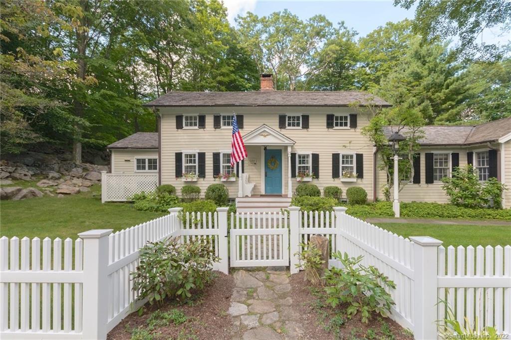 4 Pond Road Wilton, CT 06897 - Photo 1 of 1 front view of a house with a yard