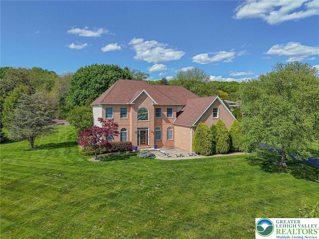 6551 Overlook Road Orefield, PA 18069 - Photo 6 of 82 a front view of a house with a yard