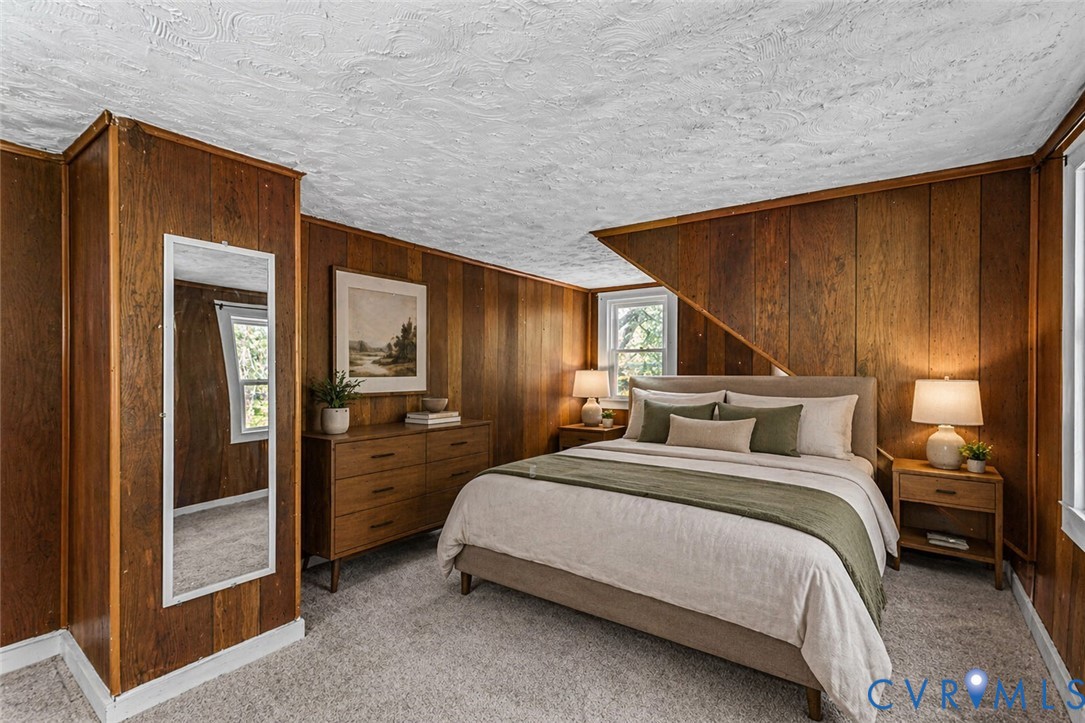 2097 Coles Point Road Hague, VA 22469 - Photo 14 of 34 a bedroom with a bed and a closet