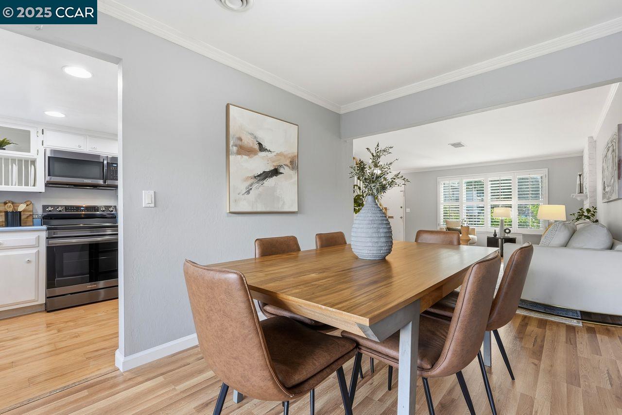 37 Miramonte Drive Moraga, CA 94556 - Photo 11 of 42 a view of a dining room with furniture and wooden floor