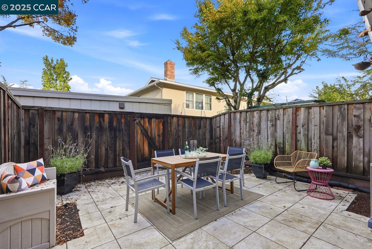 37 Miramonte Drive Moraga, CA 94556 - Photo 21 of 42 a view of a chairs and table in a backyard