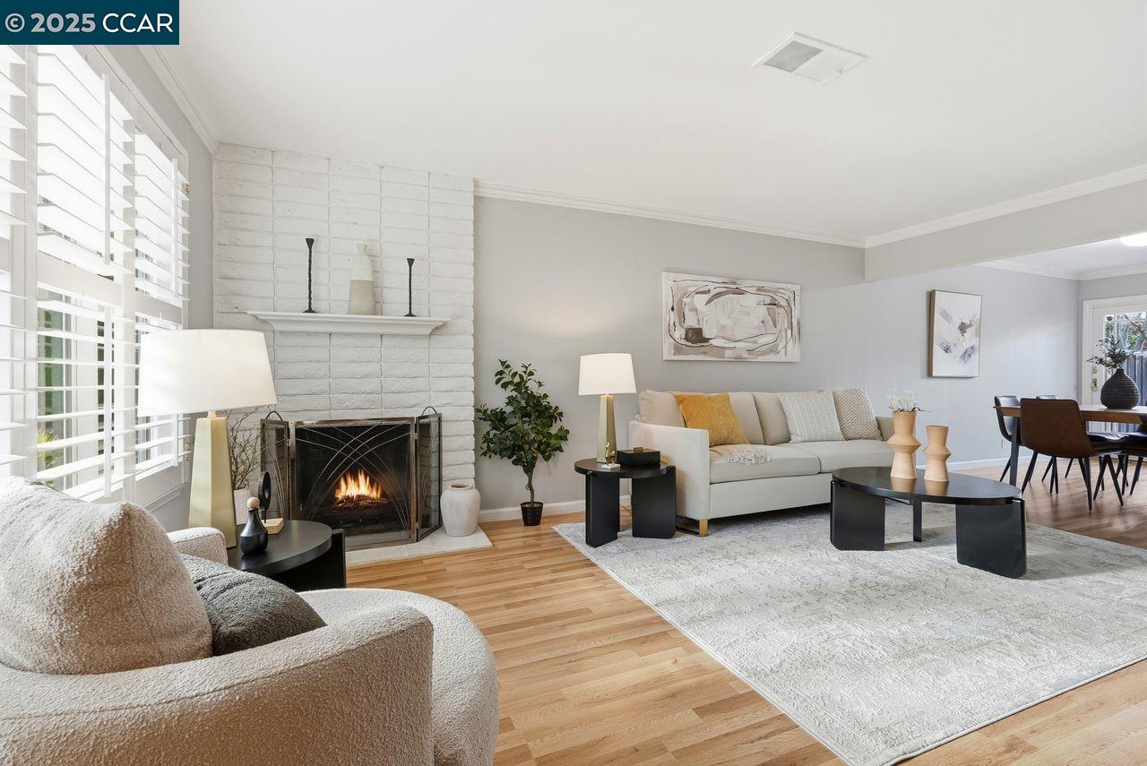 37 Miramonte Drive Moraga, CA 94556 - Photo 3 of 42 a living room with furniture and a fireplace