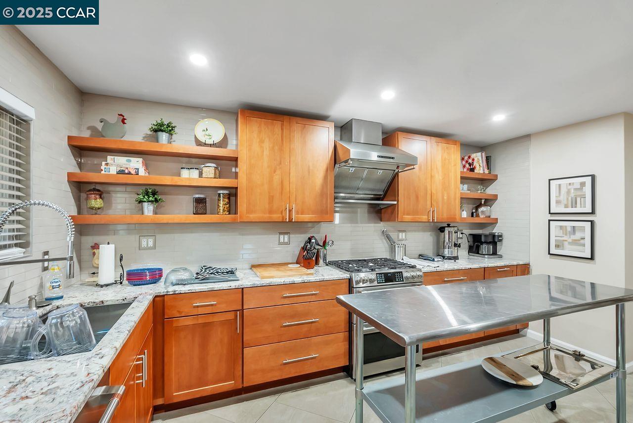 37 Miramonte Drive Moraga, CA 94556 - Photo 37 of 42 a kitchen with stainless steel appliances granite countertop a sink and a refrigerator