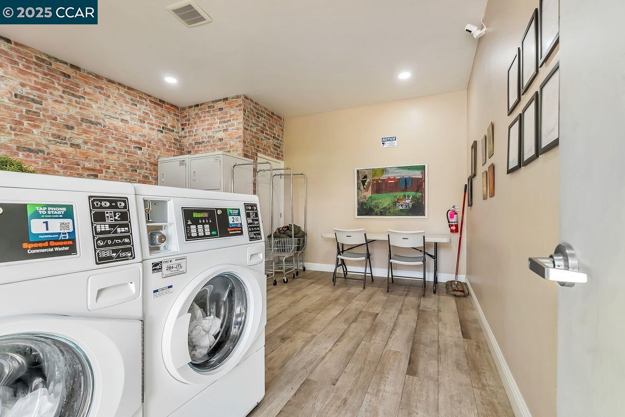 37 Miramonte Drive Moraga, CA 94556 - Photo 38 of 42 a living room with furniture a fireplace and a flat screen tv